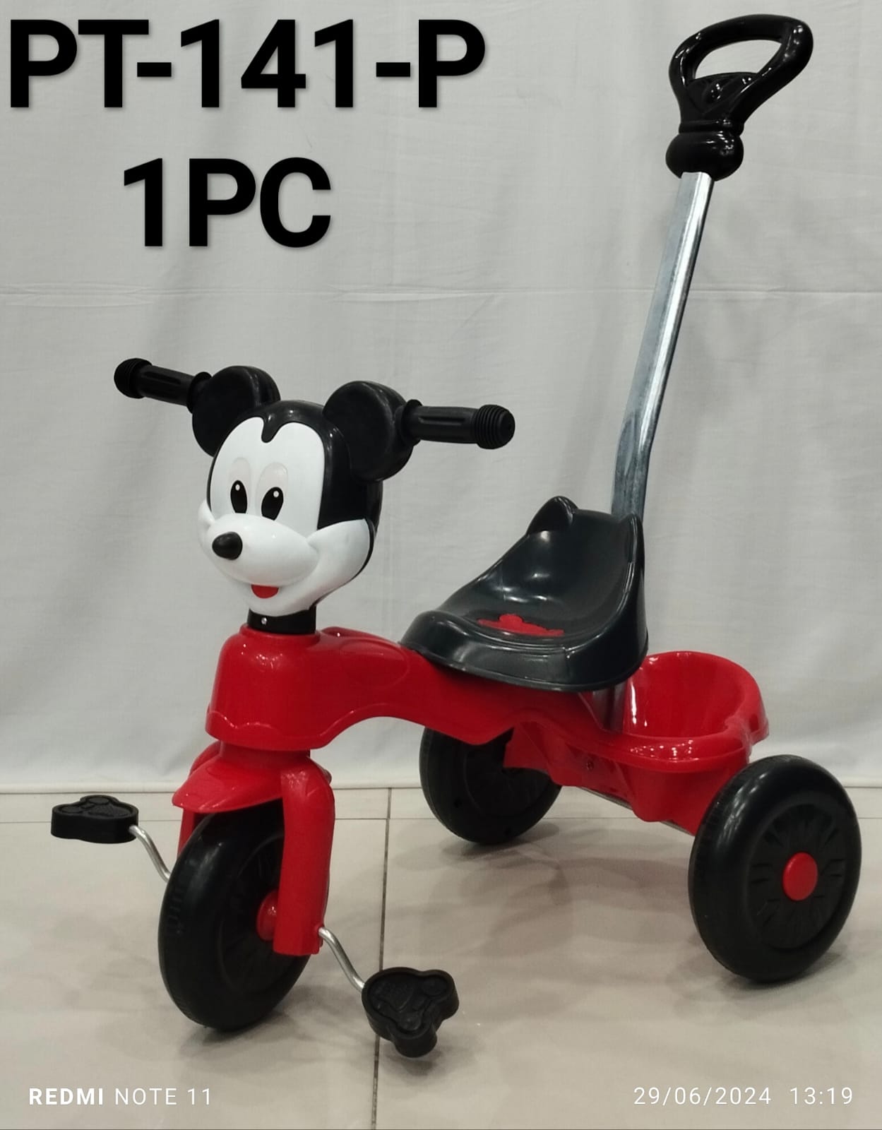 Kid's tricycle with push handle